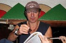 The Boss fills out some paperwork backstage at the Somerville Theatre