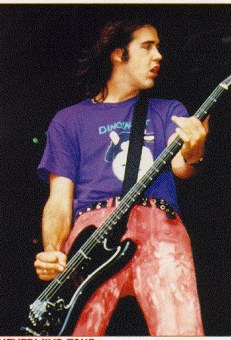 Mr. Novoselic rocks a t-shirt of a peer's band circa 1991. To say nothing of the dynamite slacks.